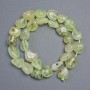 Beads of natural Prehnite, faceted, diameter 14x12-12x10 mm, length 38 cm+