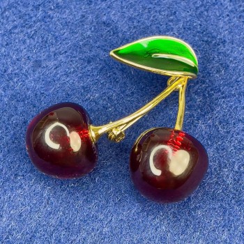 Brooch 'Cherries' with green enamel and gold-tone metal, 40×35 mm+