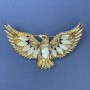 Brooch-pendant Eagle with Cat's Eye and yellow crystal, golden metal 44x73mm+
