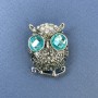Owl Brooch with blue and white crystals, silver-toned metal, diameter 27 mm, length 38 mm