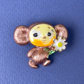 Brooch 'Cheburashka' with enamel and gold-tone metal, brown/yellow/white, 28×31 mm