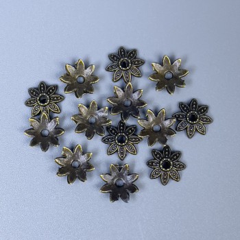 Фурнітура капелюшок для намистини колір металу бронза, діаметр 7х0, 5мм+- отвір, діаметр 0, 5мм+- фасування 70шт