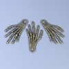 Skeleton Hand Pendant Hardware, Bronze Color, Dimensions 35x19x2 mm, Hole Diameter 3 mm, Packaging 20 g (~9 pcs)