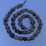 Smoky Topaz beads on thread, bicones, diameter 9-13 x 6-8 mm, length 40 cm
