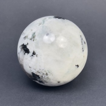 Price per 100 g. Adularia natural stone sphere with pyrite and black tourmaline inclusions, dimensions ~66 mm +/-, weight 300 g