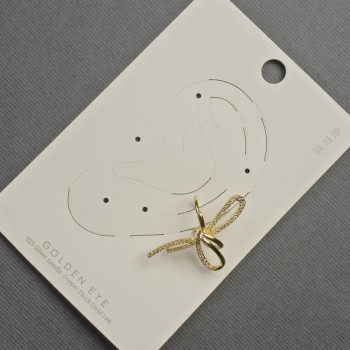 Сережка Каф на вушко Бант золотистий метал 17х30мм+-білі стрази