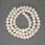 Freshwater white oval pearls on a thread, diameter approximately 5–6 mm, length 35 cm+