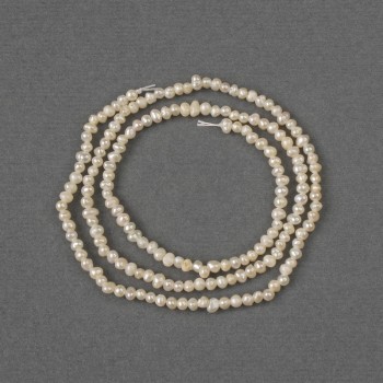 Beads of natural freshwater pearls, 2–2.5×2 mm, length 35 cm on a thread