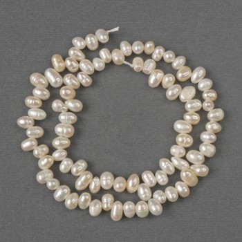 Beads of natural freshwater pearls, oval 6.5×4 mm, length 35 cm on a thread