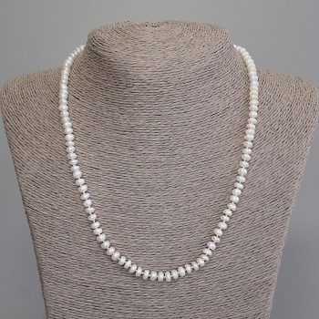 Necklace of natural freshwater pearls 5×3 mm, length 47 cm, with a clasp