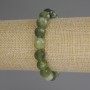Jadeite bracelet with a faceted bead, 10 mm diameter, 18 cm length (stretch)