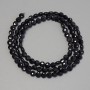 Beads of Black Tourmaline, Faceted Coin-shaped, 4 mm diameter on a thread, 39 cm length