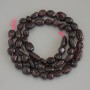 Faceted Garnet Beads, diameter 8-12×6-8 mm, on thread, length 40 cm+