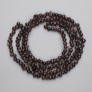 Faceted Garnet Beads, 5–6.5 × 4–5 mm, on thread, length 80 cm+