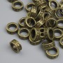 Bronze-colored bead insert findings, 7.5×3 mm, hole 5 mm, packaging ~38 pcs.