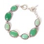 Clearance. Jade bracelet with a 'tooth' bezel, seven oval stones 20x16 mm and 13x16 mm, length 18-21 cm