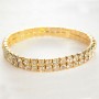 Elegant two-row elastic bracelet with white crystals and yellow metal, 17 cm circumference