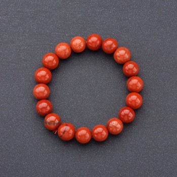 Elastic bracelet with red jasper natural stone, smooth beads, diameter 10 mm