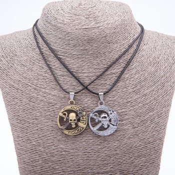 Pair of Friendship Pendants 'Pirates' on a Cord, 45 cm long, metal color 'silver and bronze'