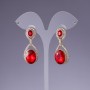 Earrings with red crystals, length 4.5 cm, yellow metal
