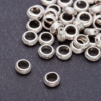 Pandora-style Bead Insert Ring, diameter 7x3 mm, hole 5 mm, packaging 20 g ± 75 pcs