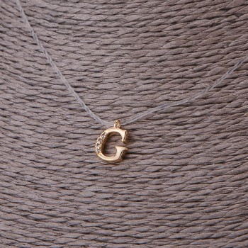 Кулон, діаметр 9мм на невидимому силіконовому шнурі, довжина 39-44см