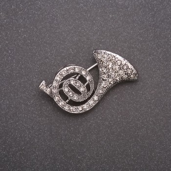 Брошка Труба в стразах сірий метал 30х20мм