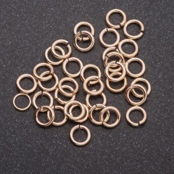 Connecting ring, 5 mm diameter, light gold color, 2 g packaging