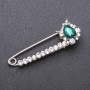 Brooch pin with green glass crystals, 64×22 mm, white metal