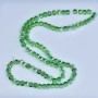 Crystal beads Swarovski style, light-green, faceted beads with 'gasoline' coating, 5×4 mm, 48 cm strand