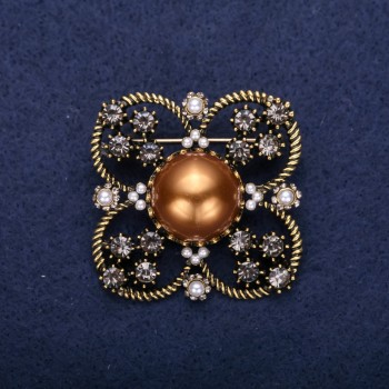 Brooch 'Order of Beauty' with pearl bead centerpiece and crystals, color brown, gray, white, 42×51 mm, yellow metal