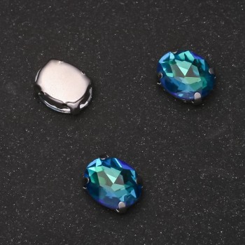 Price per pack / 10 pcs. Sew-on crystal in a metal prong setting, oval 8x10 mm green-blue