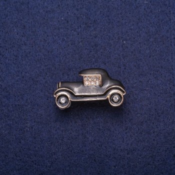 Brooch 'Car' with black enamel and crystals, gold-tone metal 17x29mm