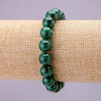 Bracelet made of natural malachite — smooth bead, diameter 10 mm (±), on elastic cord, length 18 cm