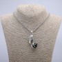Pendant "Bird with a Ball" 47×18 mm on a chain, length 70 cm +/- silver metal