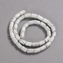 Beads on a string of natural howlite, smooth cylindrical, diameter 10x6 mm +/-, length 41 cm +