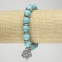 Turquoise bracelet (synthetic) on elastic, 10mm diameter ± with silver inserts and a pendant, length 18 cm+