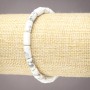 Elastic bracelet made from natural Kaholong with smooth cylindrical beads, diameter 10x6 mm
