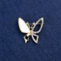 Brooch 'Butterfly' in golden metal, with mother-of-pearl and crystals, 27mm+
