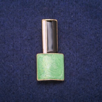 Брошка Лак зелена, чорна і біла емаль, золотистий метал 18х39мм