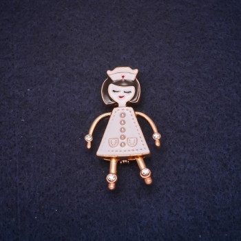 Brooch 'Nurse' enamel white, 42 x 26 mm, golden metal