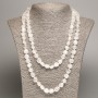 Long necklace made from rock crystal and white quartz haltuvannya, diameter 5x8-10 mm, length 110 cm