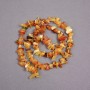 Amber chip beads on a string, diameter 8x3 mm +-, length 39 cm +
