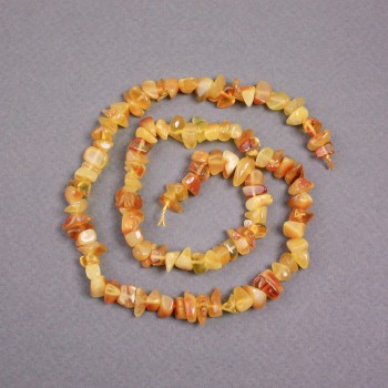 Amber chip beads on thread, diameter 7x4 mm +/-, length 39 cm+