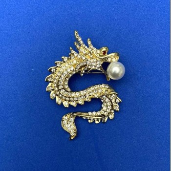 Dragon Brooch in Golden Metal, white crystals, white bead, 45x64 mm