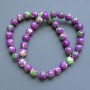 Beads 'Variscite' (synthetic acrylic) violet, white, and green smooth round beads, 10.5 mm diameter, about 40 cm long on a thread