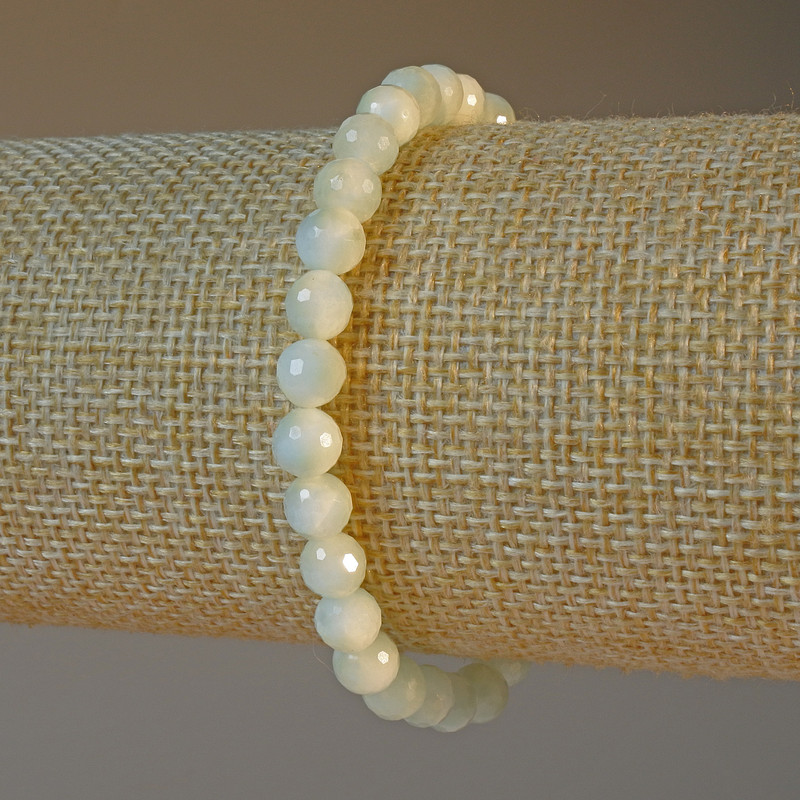 Angelite bracelet, natural stone with a faceted bead, 6 mm diameter ±, length 18 cm ± (stretch)