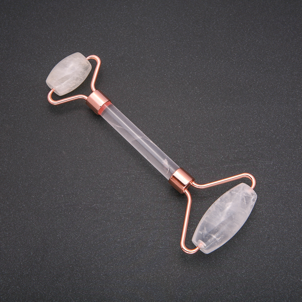 Roller massager made of natural Mountain Crystal, length 14.5 cm, copper-colored metal
