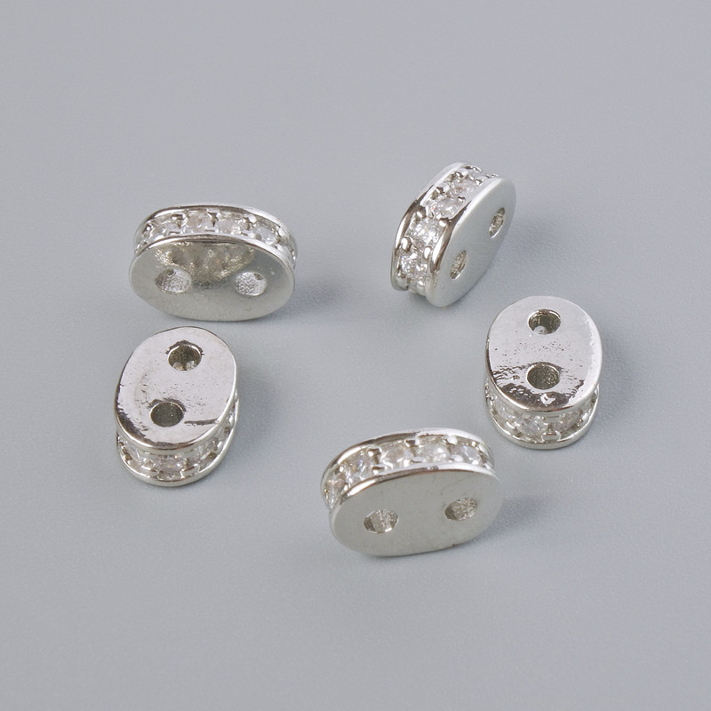 Separator bead for two strands with white crystals, silver-colored metal finish, diameter 8x3 mm, 1 pc