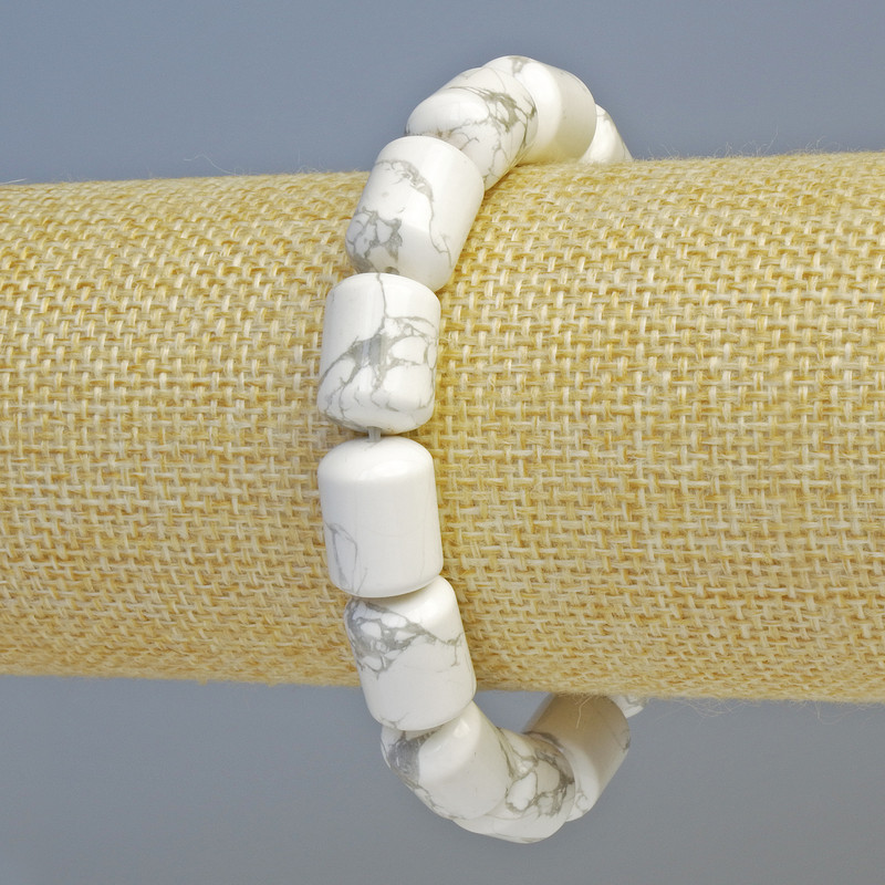 Bracelet with natural kacholong cylindrical beads, diameter 10×14 mm ± (stretch), length 18 cm+